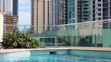 2 outdoor pools, open 6:00 AM to 9:00 PM, pool loungers