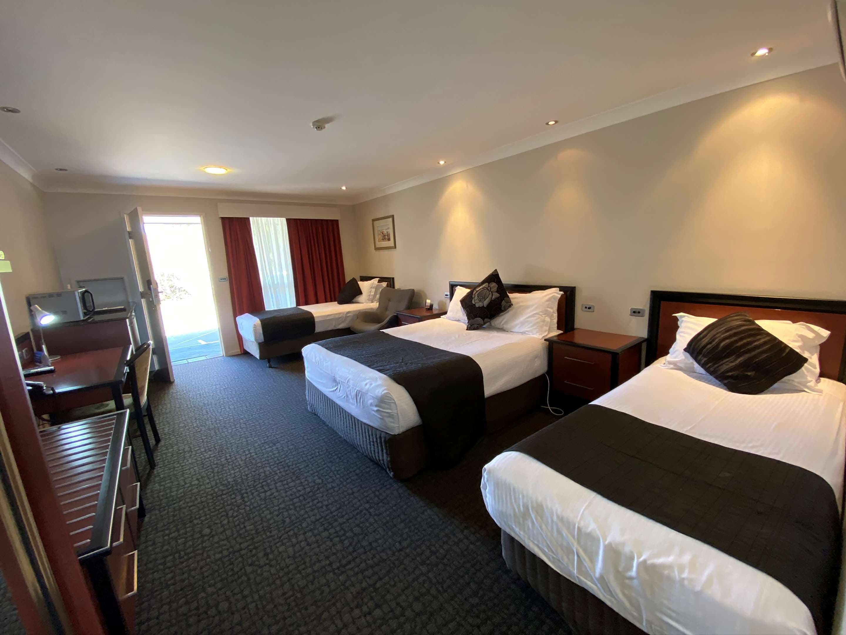 family room, multiple beds, non smoking, microwave | premium bedding, pillow-top beds, in-room safe, desk