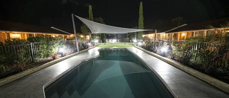 Outdoor pool, open 7:00 AM to 9:00 PM, pool umbrellas, pool loungers