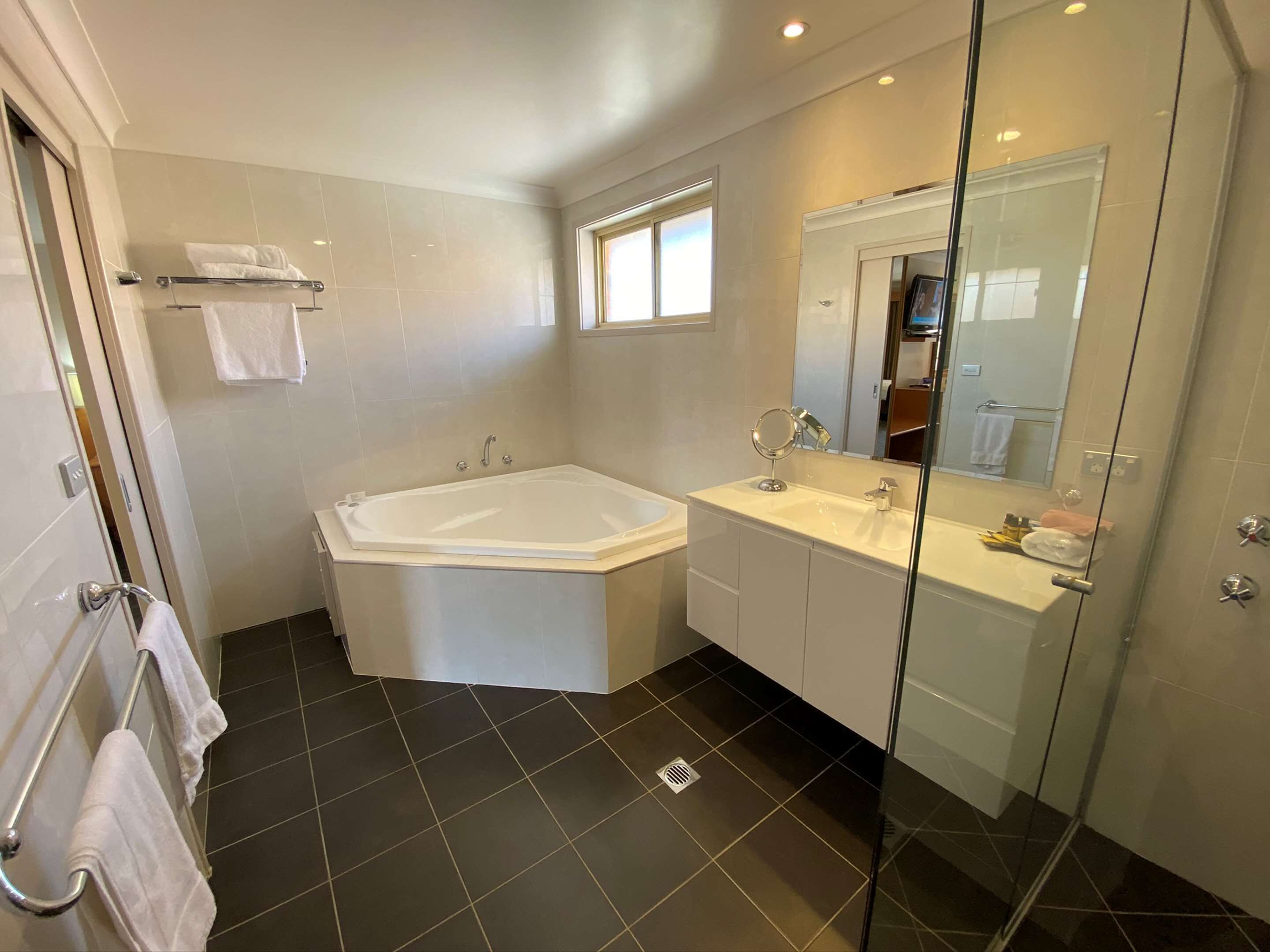 separate bathtub and shower, free toiletries, hair dryer, bathrobes