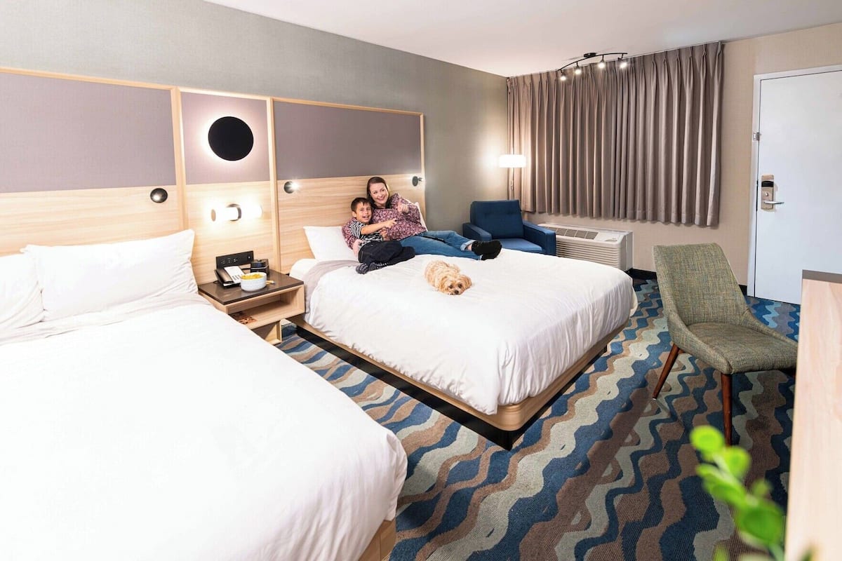 Premium bedding, pillowtop beds, desk, blackout drapes