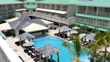 Outdoor pool, pool umbrellas, sun loungers