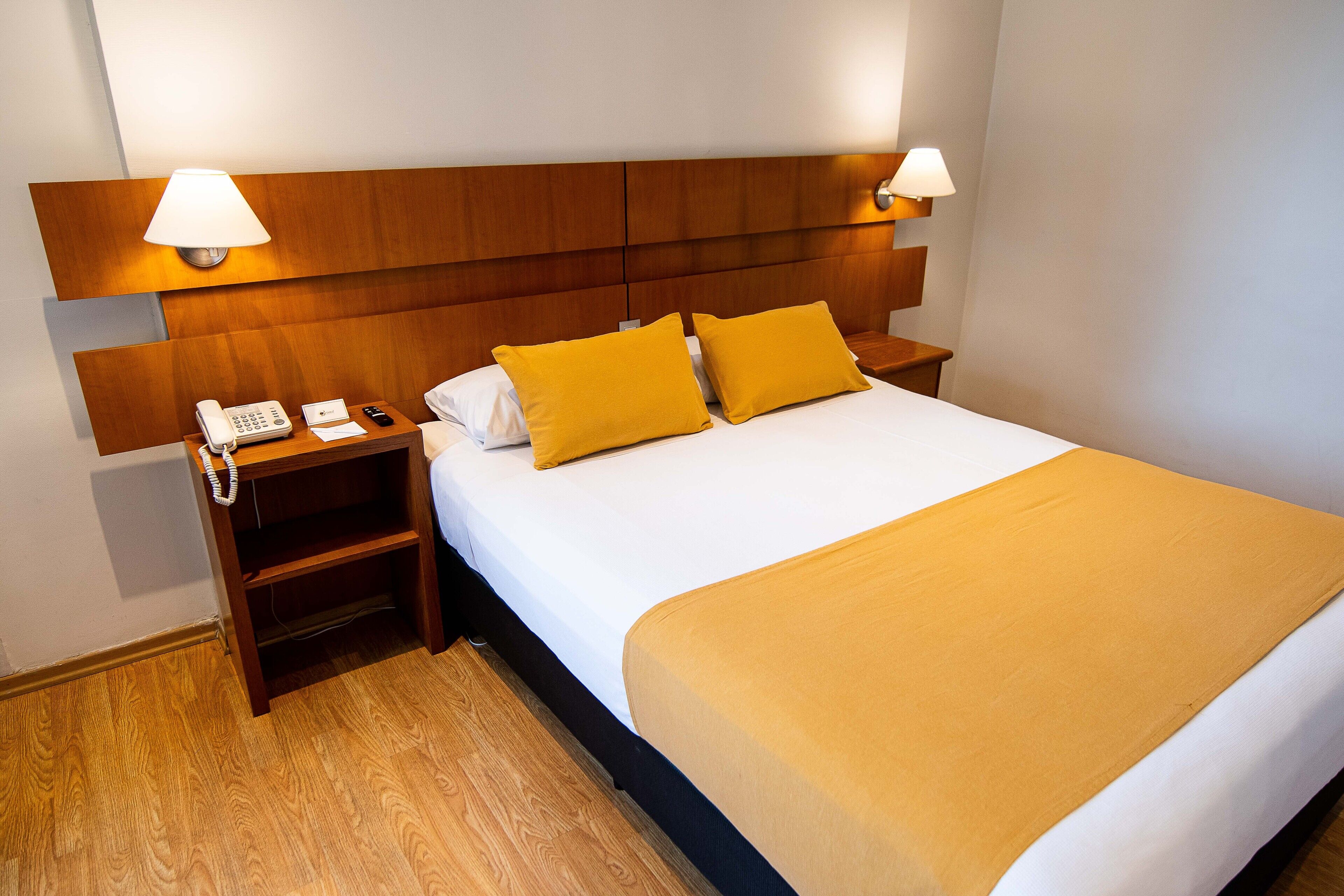 Standard Room, 1 Queen Bed, City View | Hypo-allergenic bedding, minibar, in-room safe, desk
