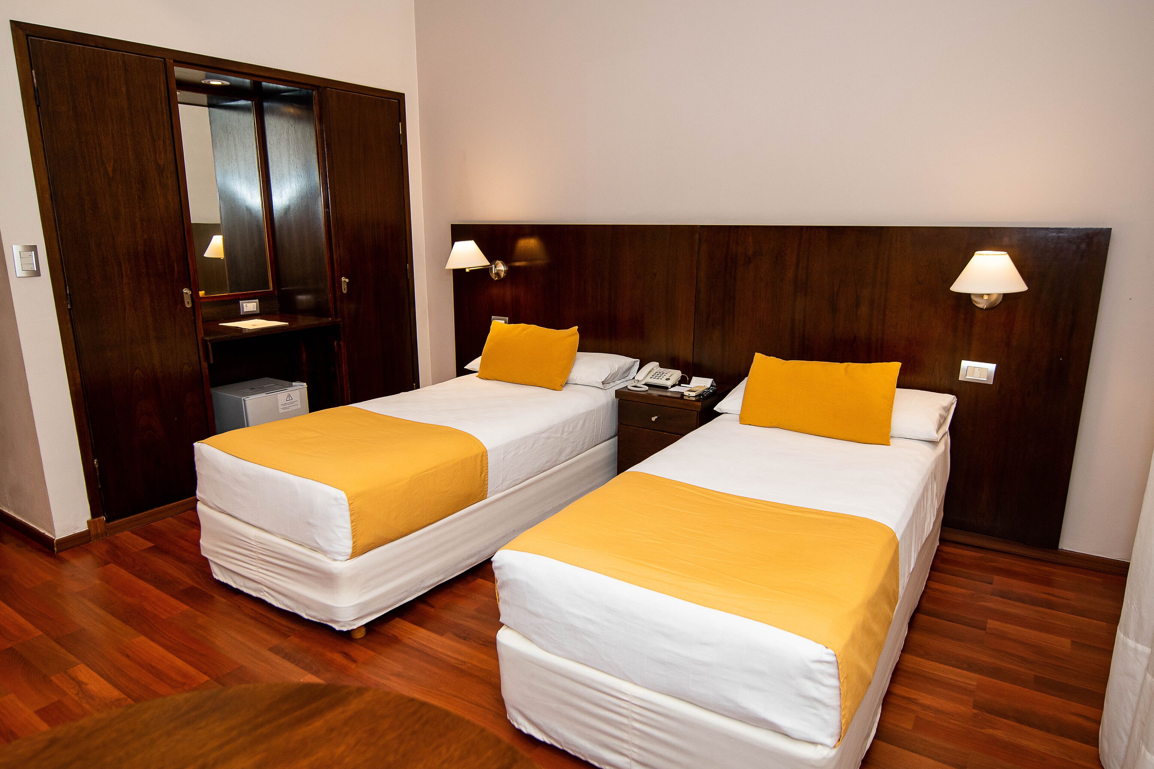 standard room, 2 single beds | hypo-allergenic bedding, minibar, in-room safe, desk