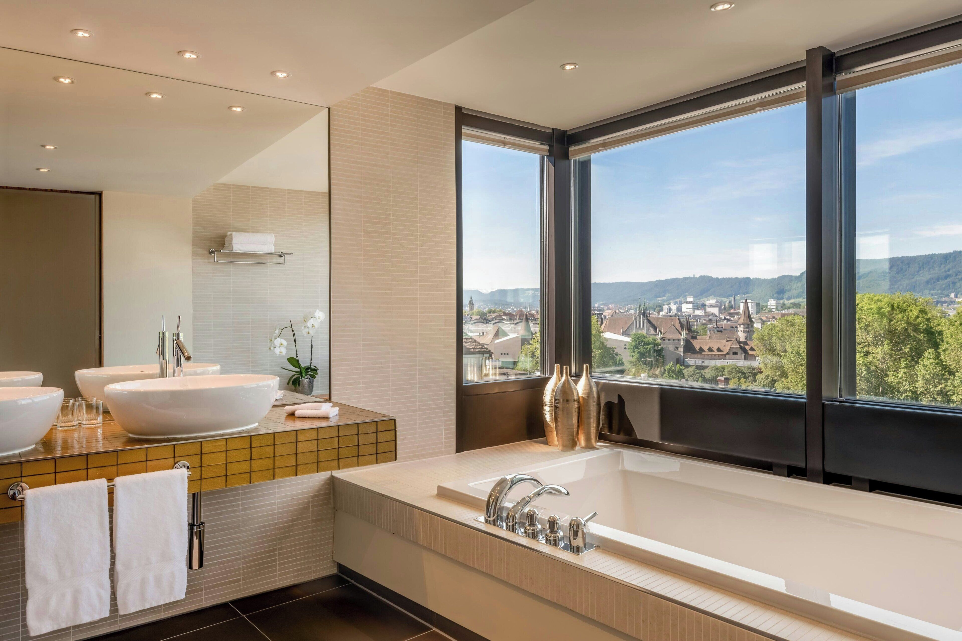 club suite, 1 bedroom | bathroom | designer toiletries, hair dryer, bathrobes, slippers