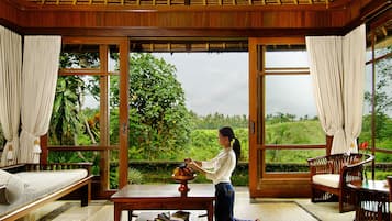 Villa, 1 Bedroom, Garden View (1x Floating B'fast for 3 Night Stay) | Living area | TV, fireplace, DVD player, pay movies