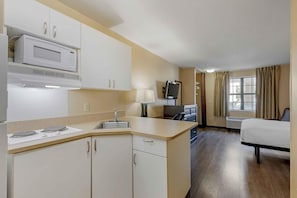 Studio, 1 Queen Bed, Non Smoking | Private kitchen | Full-size fridge, microwave, stovetop, coffee/tea maker