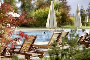 Indoor pool, outdoor pool, pool umbrellas, pool loungers