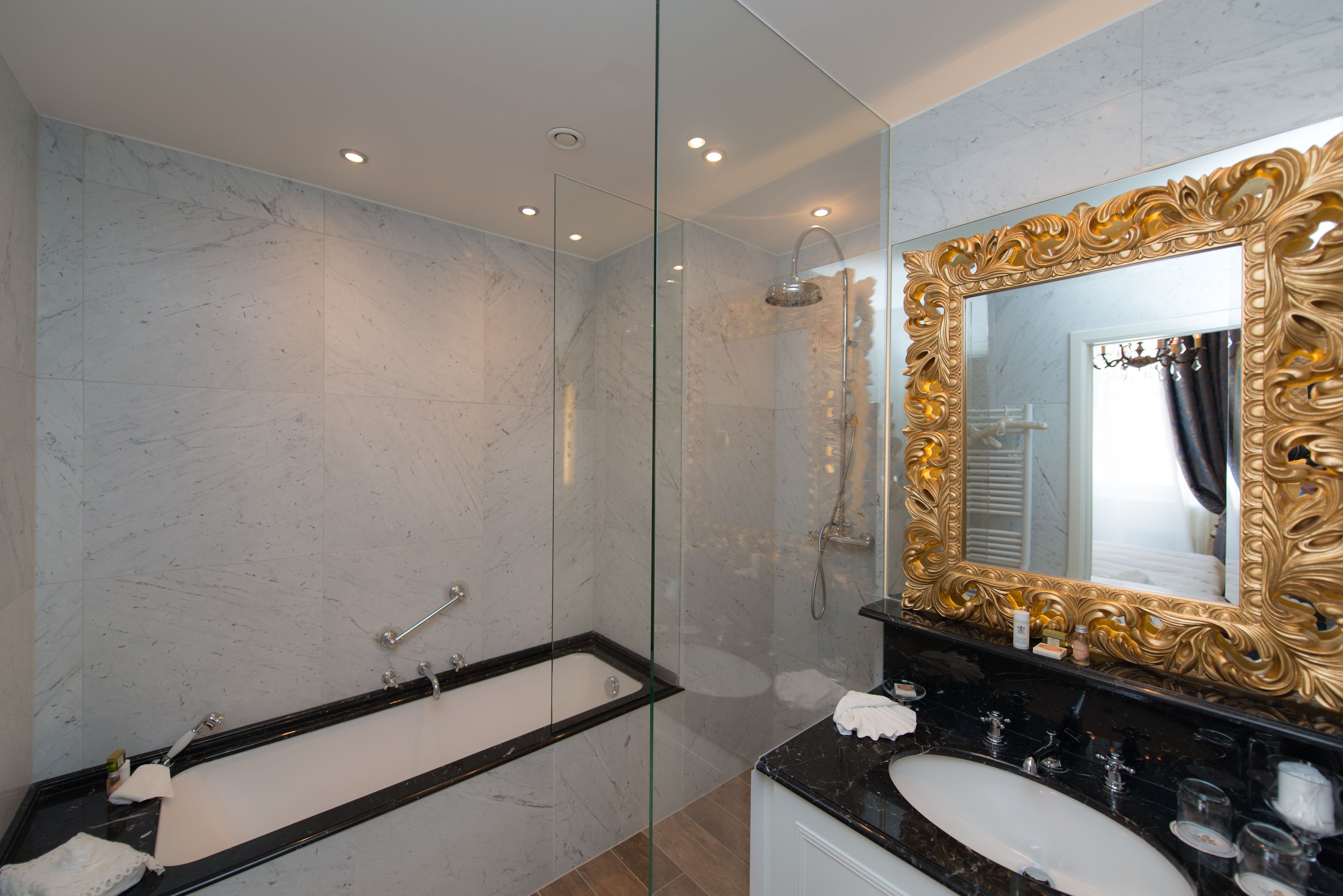 designer toiletries, hair dryer, bathrobes, slippers