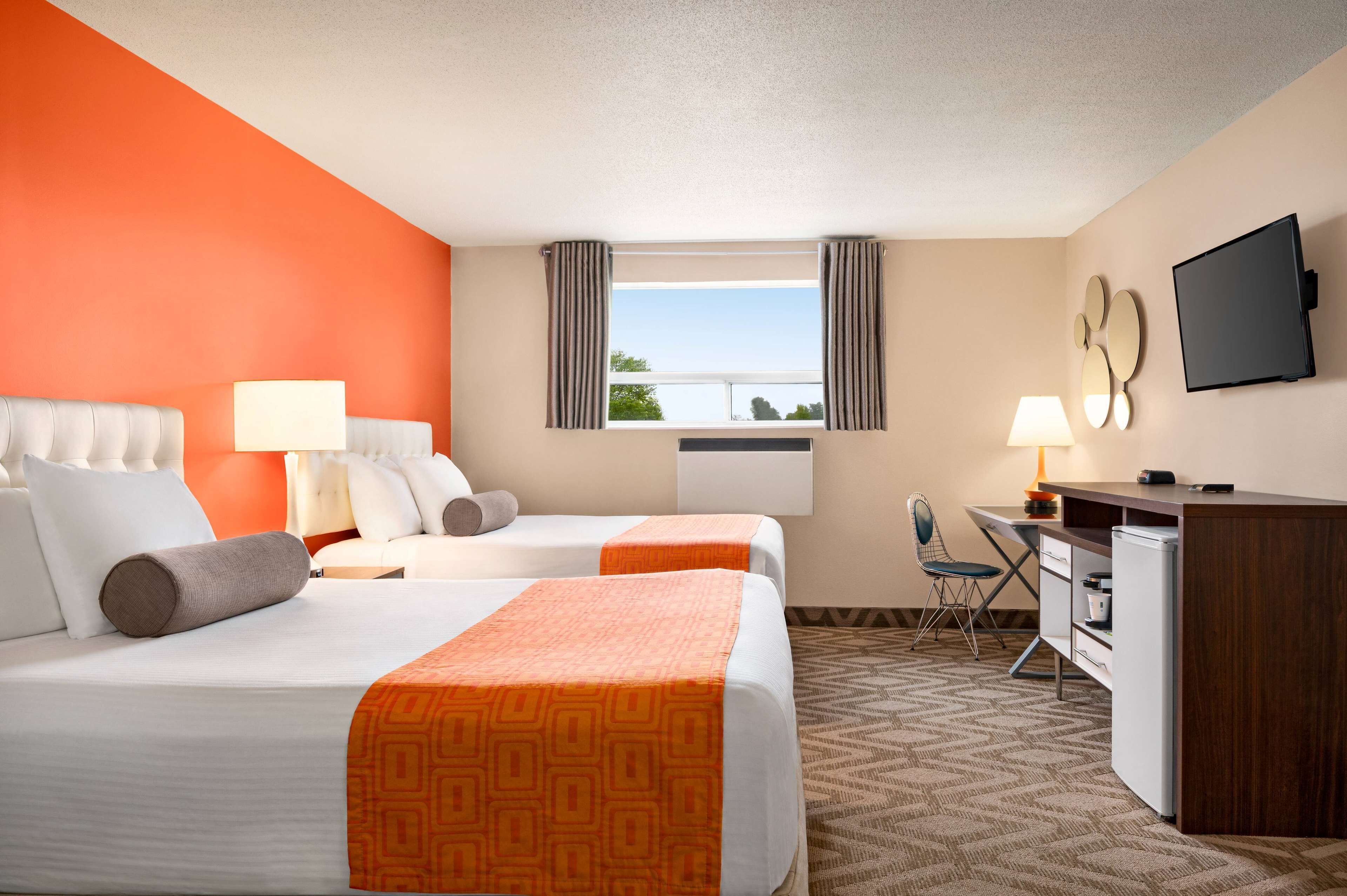 Room, 2 Queen Beds, Non Smoking | Desk, iron/ironing board, free cribs/infant beds, rollaway beds