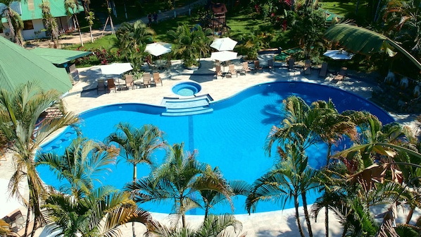 Outdoor pool, open 6:00 AM to 10:00 PM, pool umbrellas, sun loungers