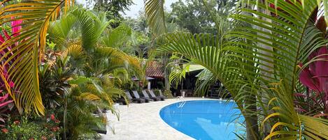 2 outdoor pools, open 6:00 AM to 10:00 PM, pool umbrellas, sun loungers