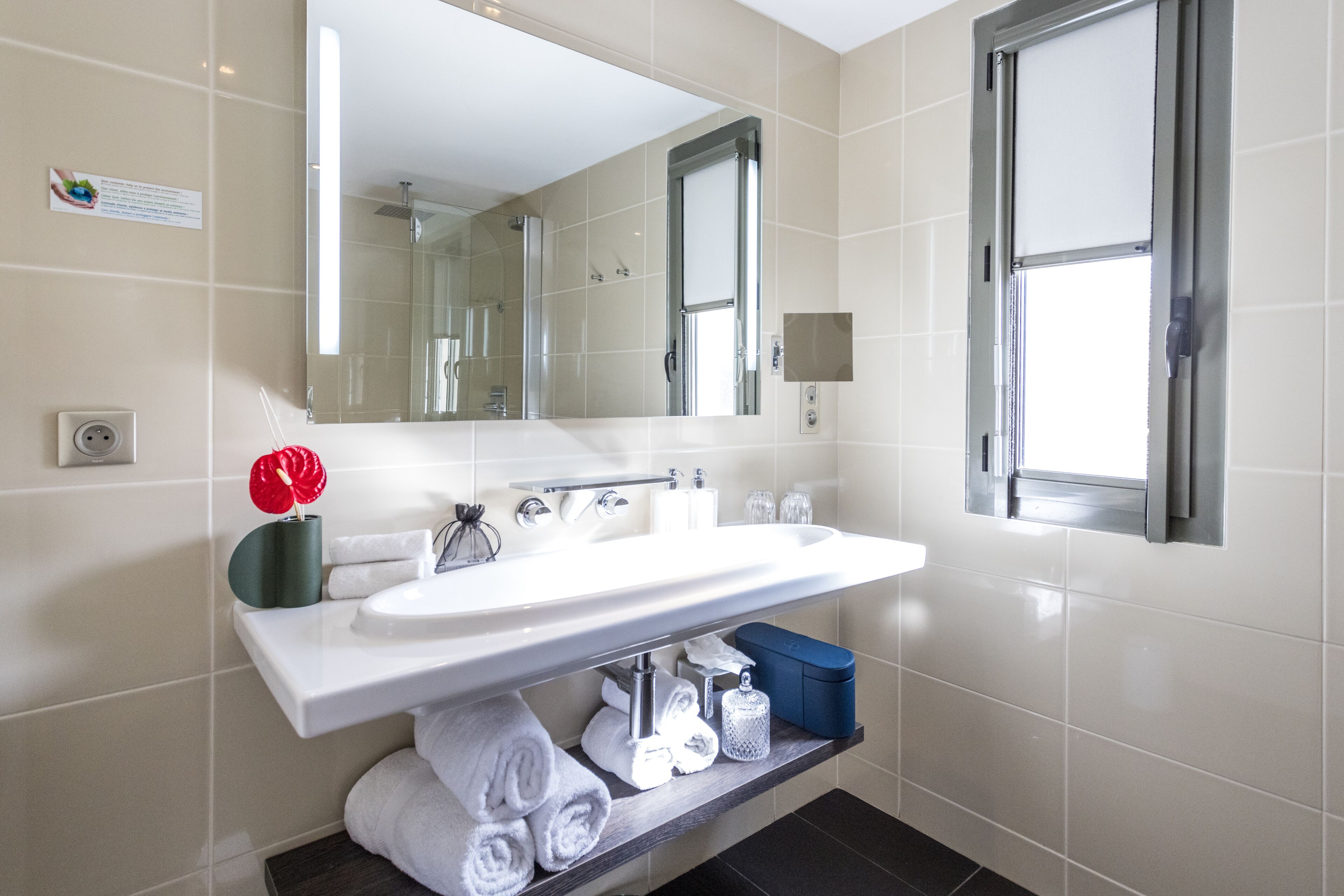 junior suite | bathroom | combined shower/bathtub, hair dryer, slippers, towels