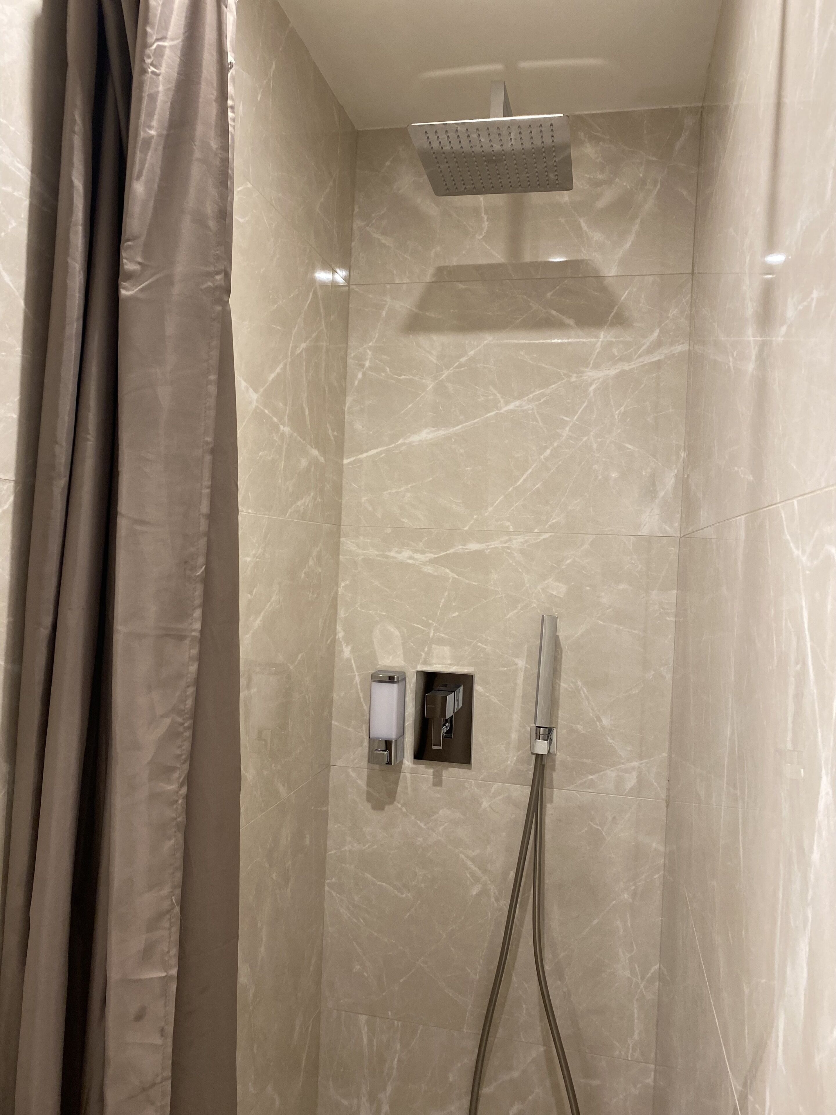 single room | bathroom | hair dryer, slippers, towels