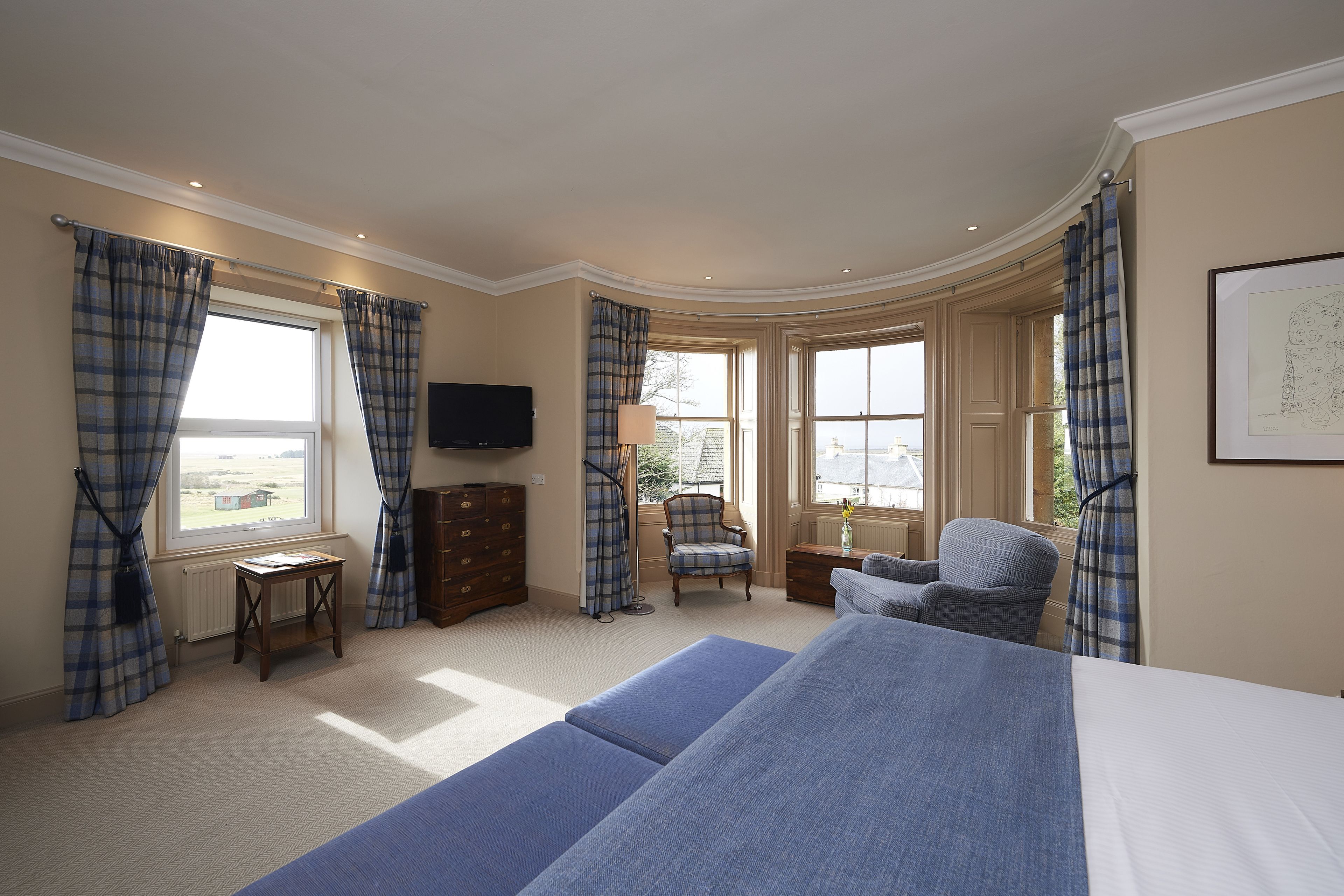 premium bedding, desk, blackout curtains, iron/ironing board