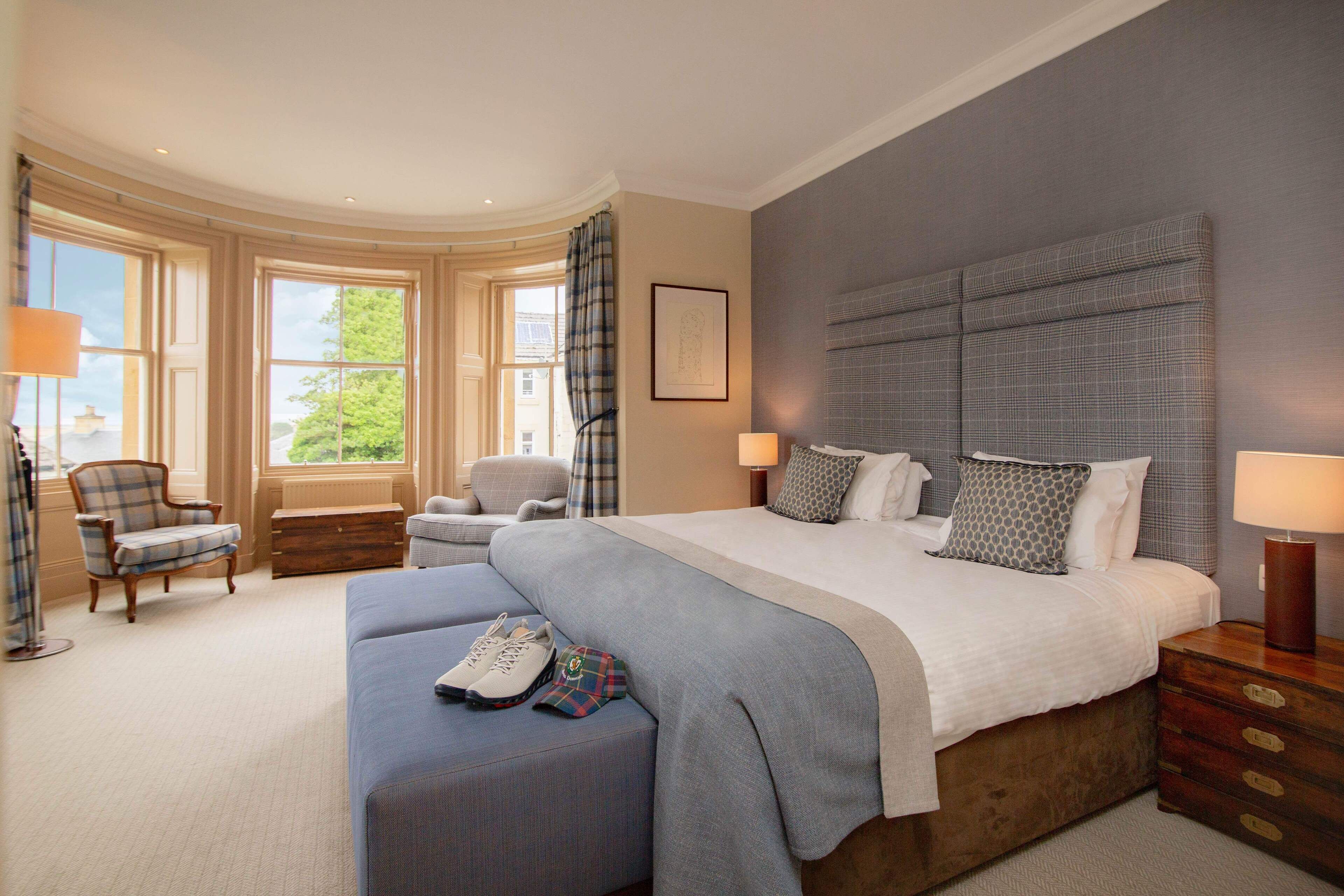 junior suite | premium bedding, desk, blackout curtains, iron/ironing board