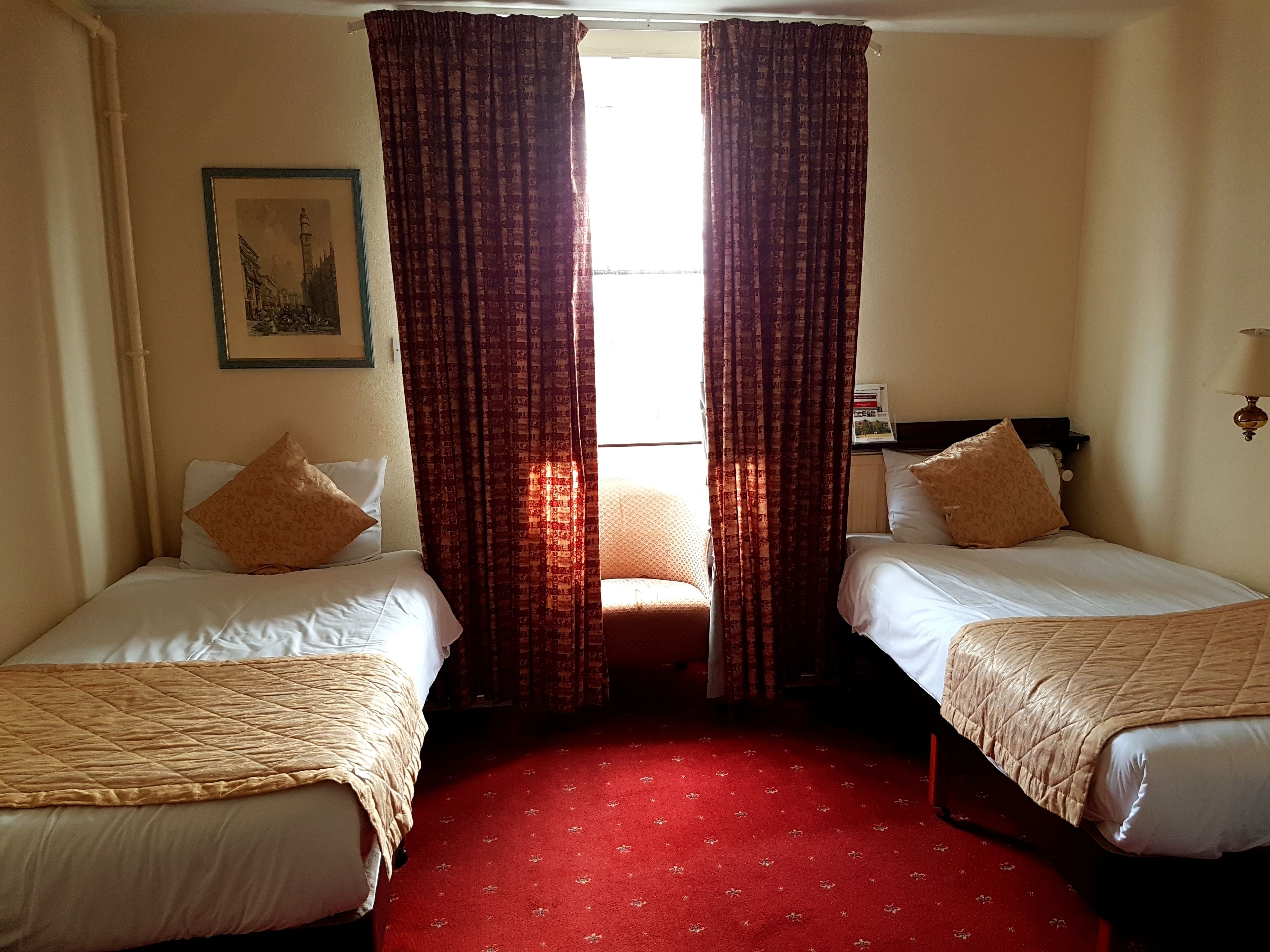 standard twin room, 2 single beds | in-room safe, iron/ironing board, wifi