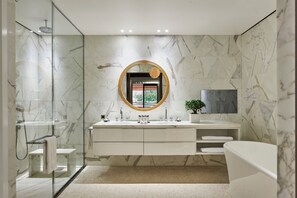 Junior Suite, Sea View | Bathroom | Designer toiletries, hair dryer, bathrobes, slippers