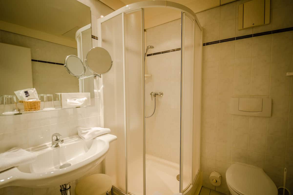 Hair dryer, towels, soap, shampoo