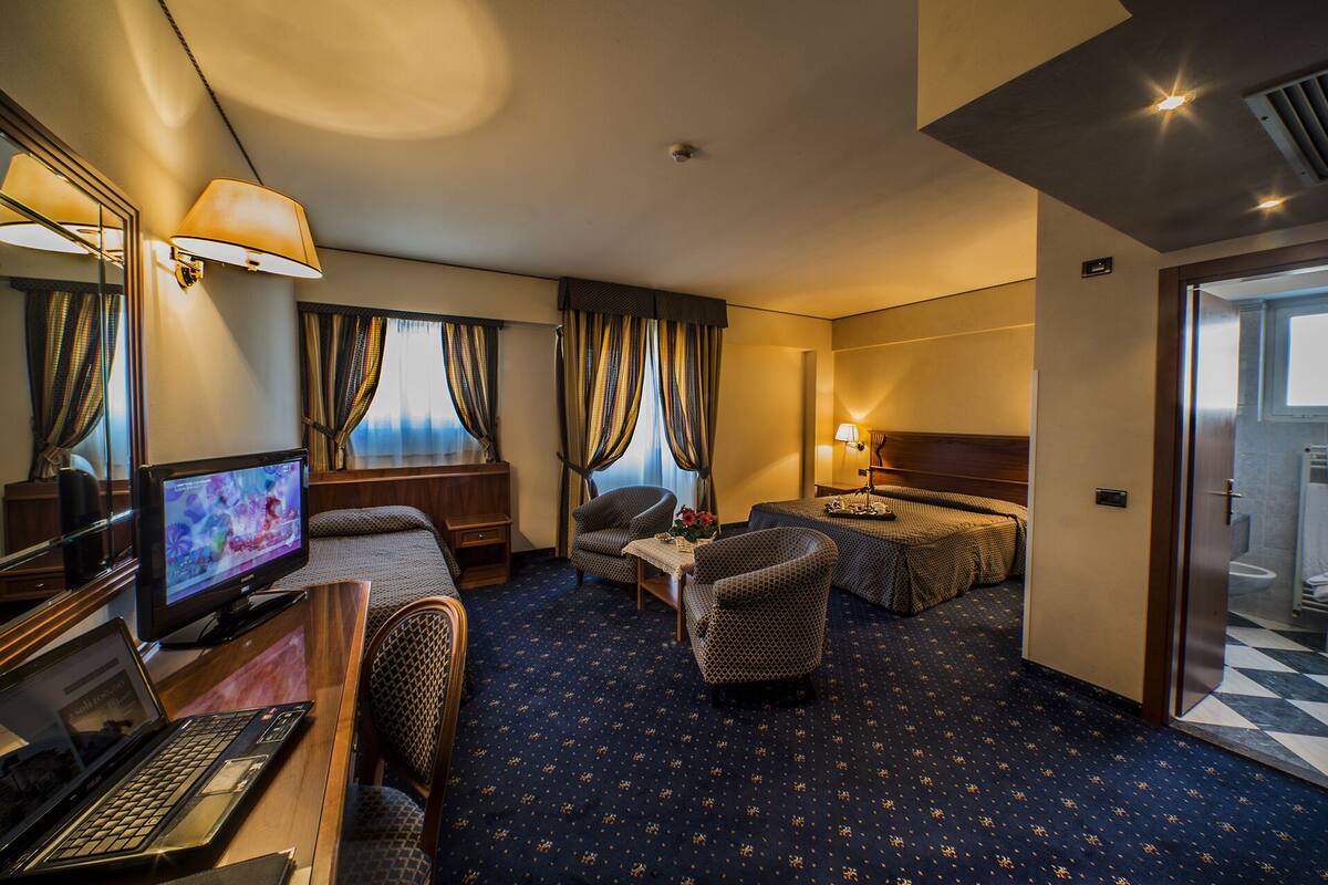 family room (quadruple) | minibar, in-room safe, desk, blackout curtains