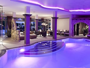 Indoor pool, outdoor pool, open 10:00 AM to 10:00 PM, pool umbrellas