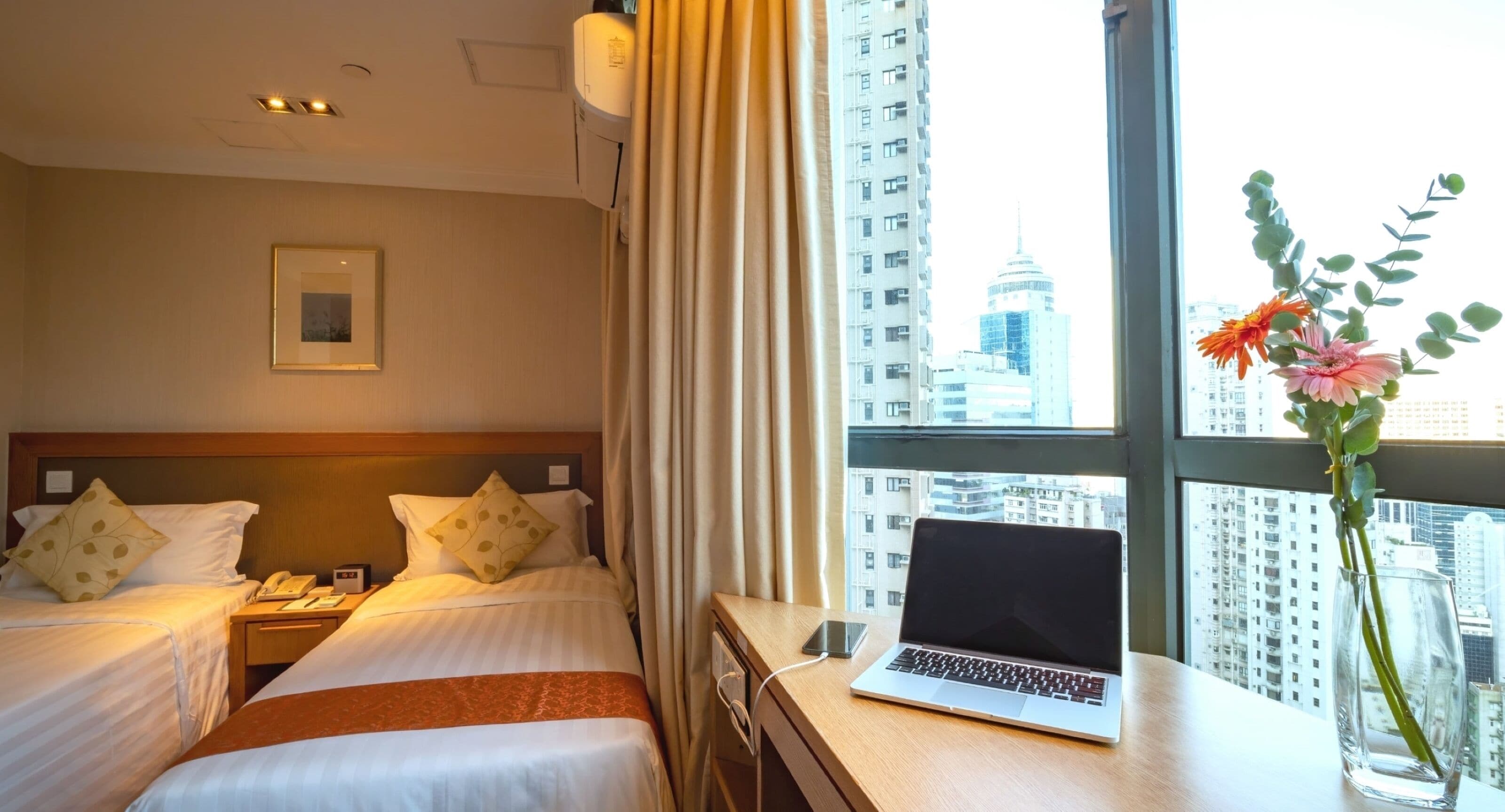deluxe room, city view | 1 bedroom, in-room safe, desk, blackout curtains