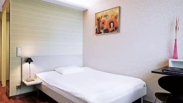 Habitación individual estándar | Sábanas de algodón egipcio, ropa de cama hipoalergénica, caja fuerte