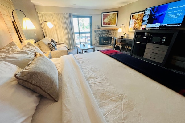 Premium bedding, desk, blackout drapes, iron/ironing board