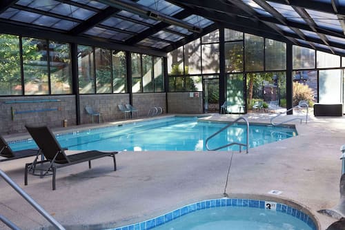 Indoor pool, seasonal outdoor pool, pool umbrellas, sun loungers