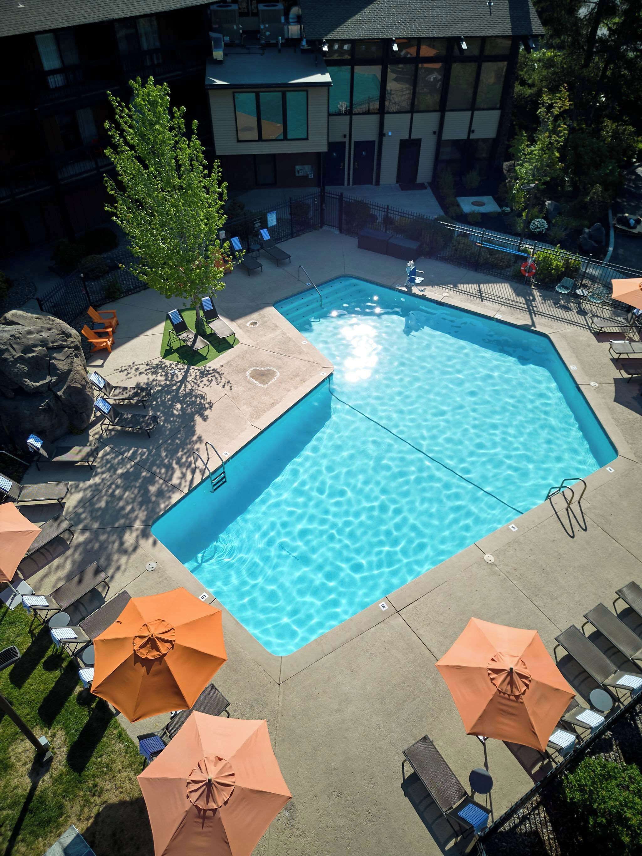 Indoor pool, seasonal outdoor pool, pool umbrellas, sun loungers