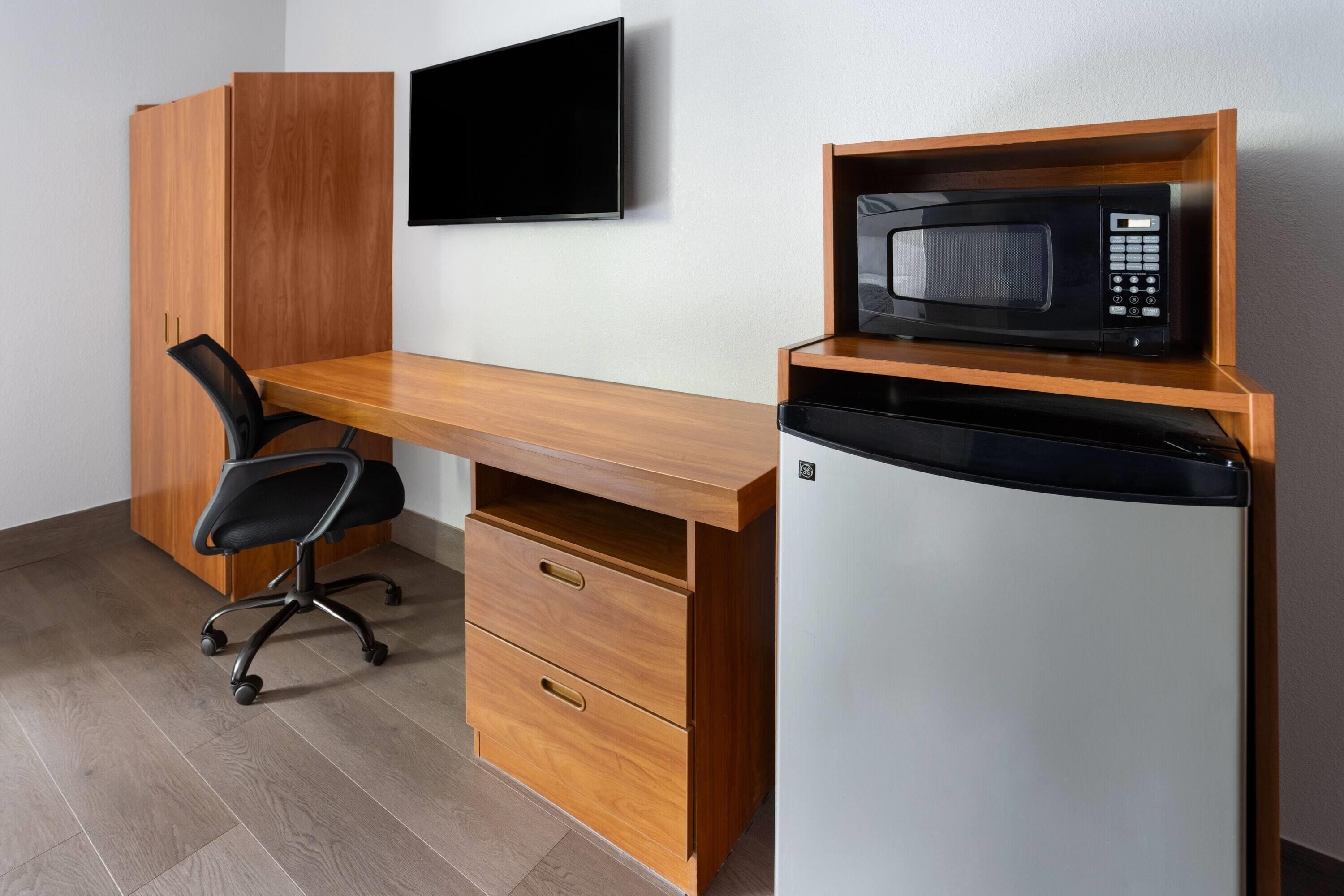 hypo-allergenic bedding, desk, blackout curtains, iron/ironing board