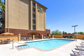 Outdoor pool, pool umbrellas, sun loungers