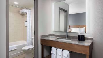 Designer toiletries, hair dryer, towels, soap