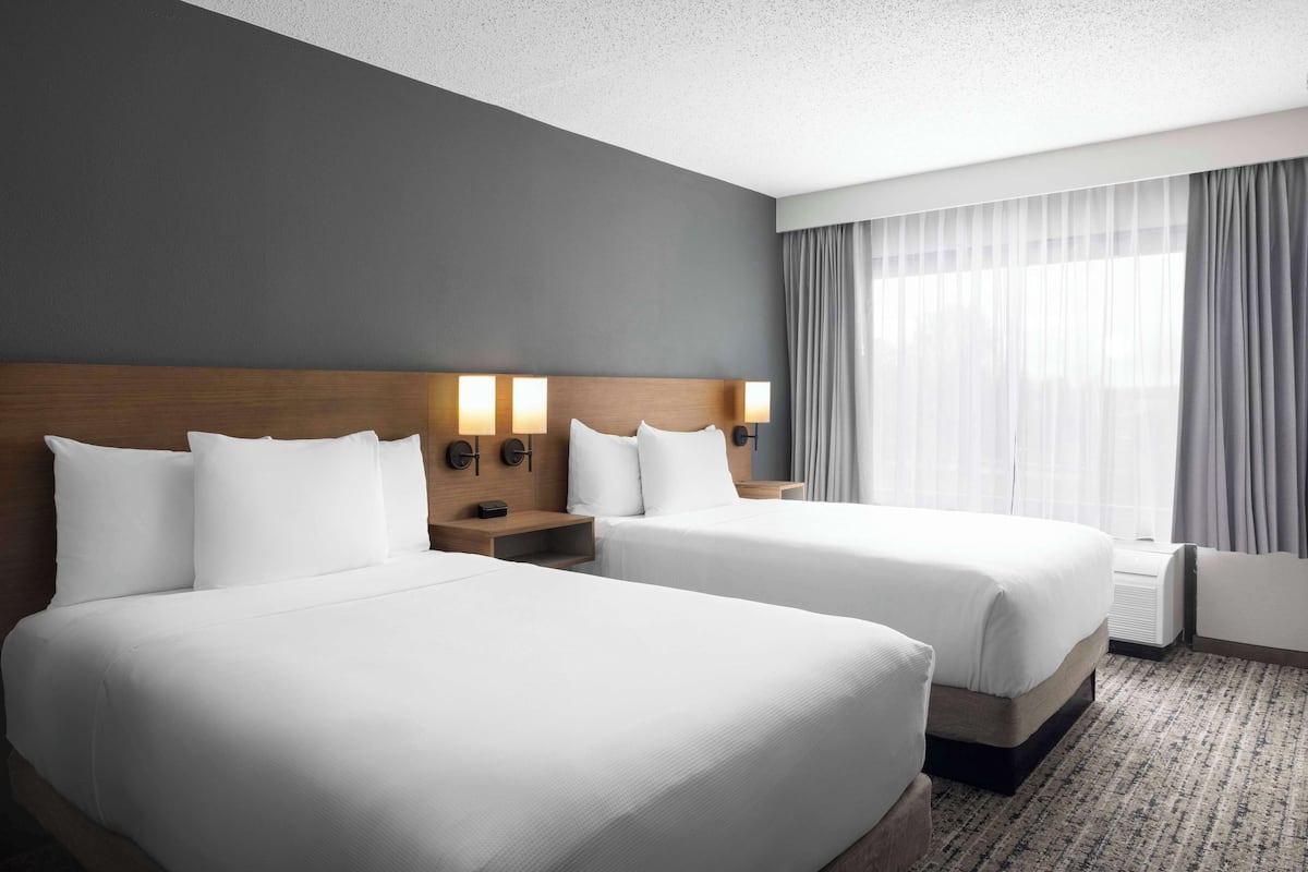 Premium bedding, down duvets, in-room safe, desk