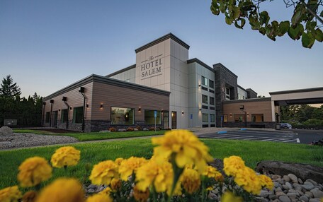 A modern hotel with a prominent sign reading "The Hotel Salem."