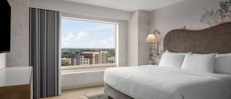 Premium bedding, pillow-top beds, desk, laptop workspace