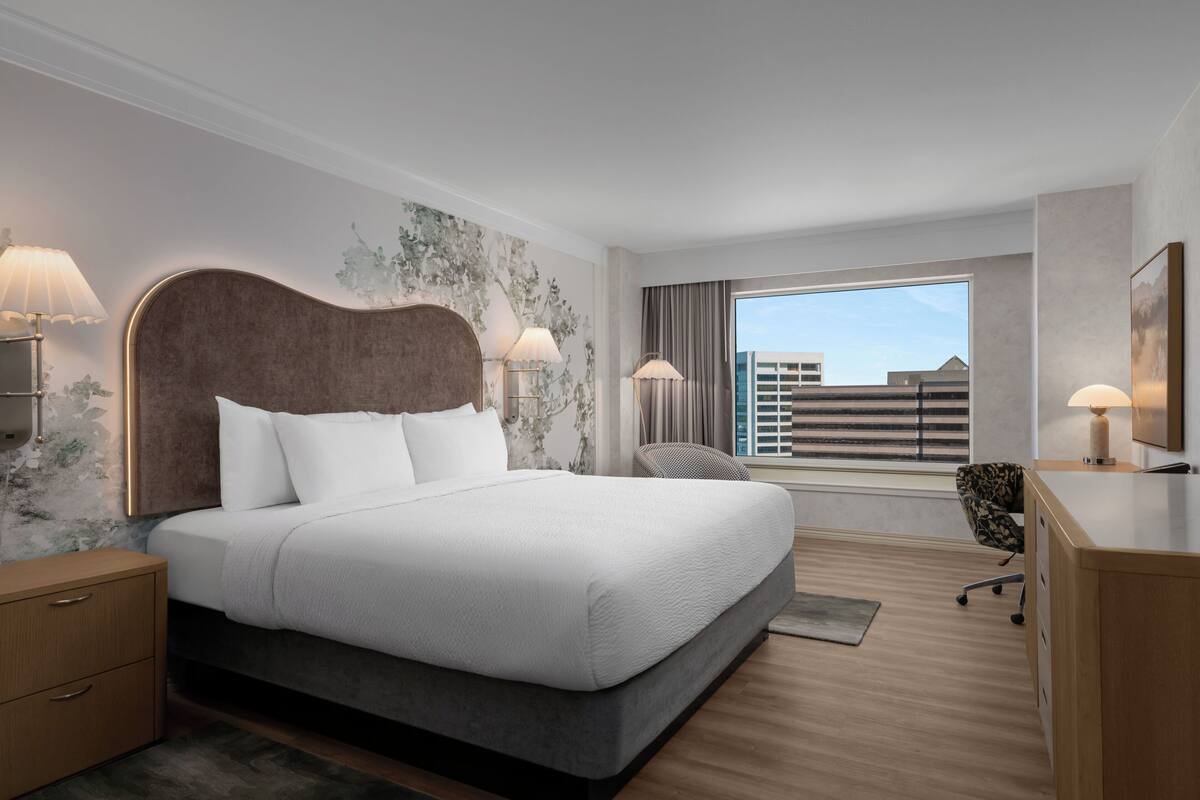 Premium bedding, pillow-top beds, desk, laptop workspace