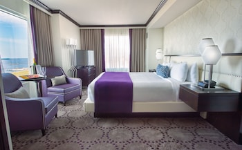 Parlor King Suite Non Smoking | Premium bedding, in-room safe, desk, laptop workspace at Harrahs Gulf Coast