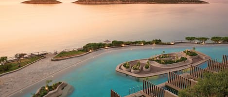 Infinity Lagoon Suite with Private Pool | Premium bedding, minibar, in-room safe, desk