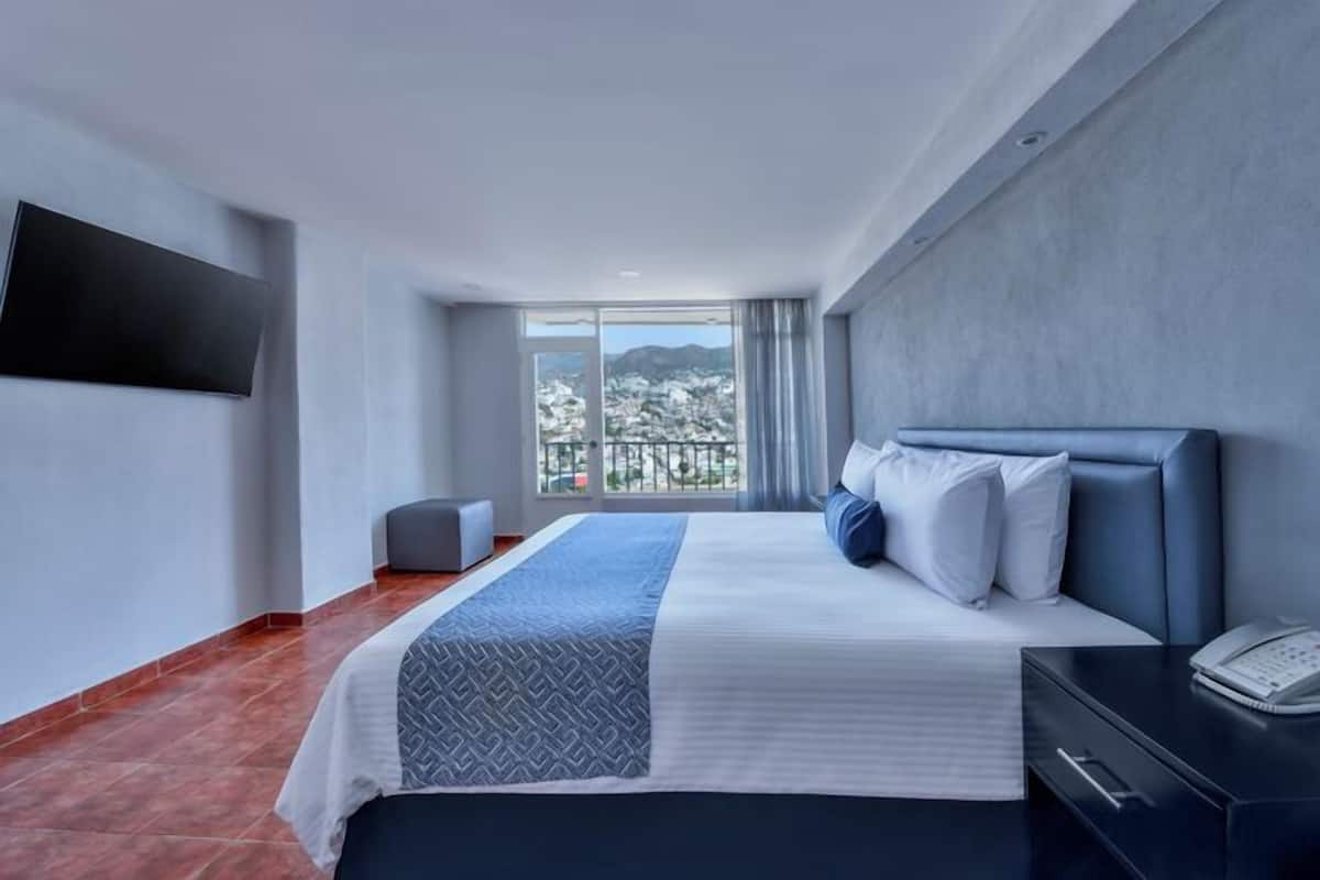 Suite King Mountain View | ผ้านวมขนเป็ด, ตู้นิรภัยในห้องพัก, ผ้าม่านกันแสง, เตารีด/โต๊ะรีดผ้า