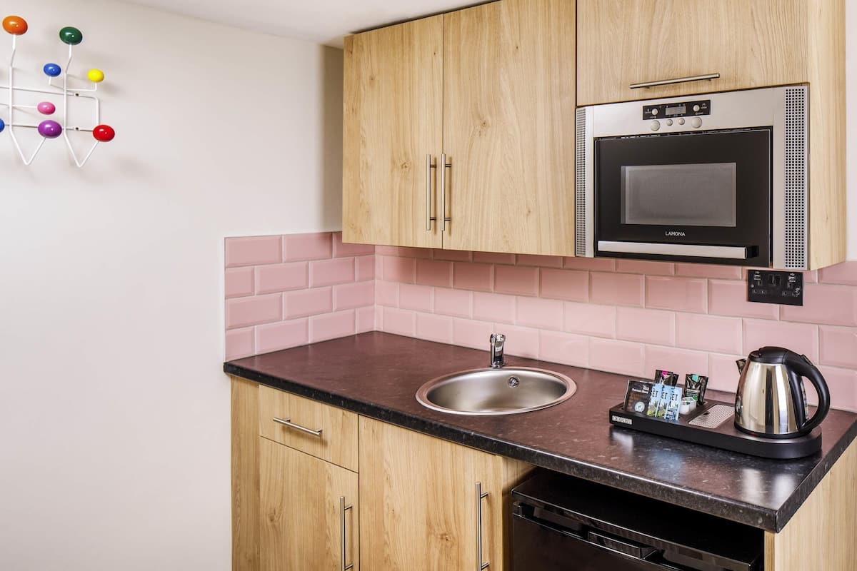 room, 1 queen bed with sofa bed (the works) | individually furnished, desk, blackout curtains, free wifi