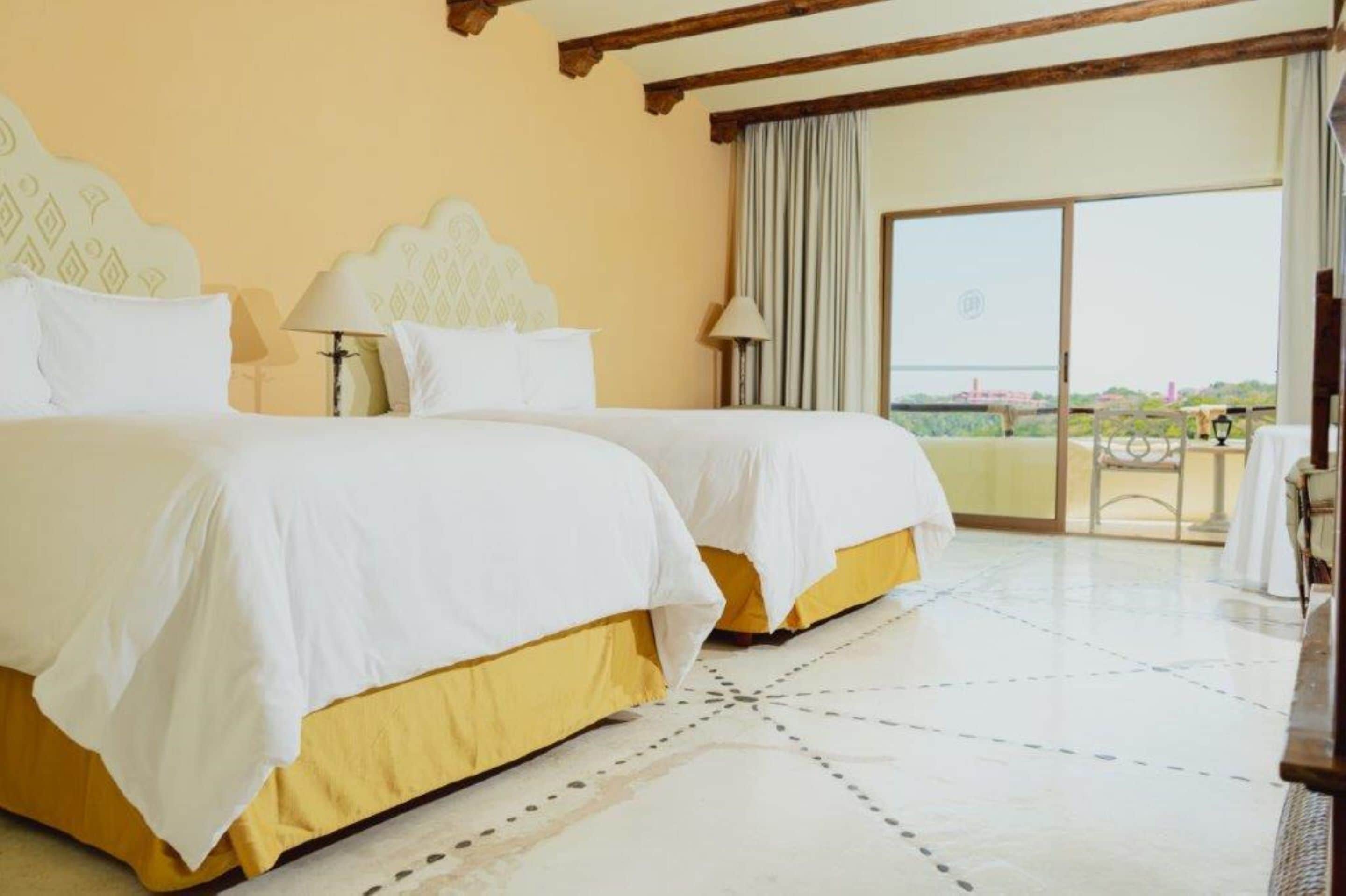 master suite dos camas | 1 bedroom, premium bedding, minibar, in-room safe