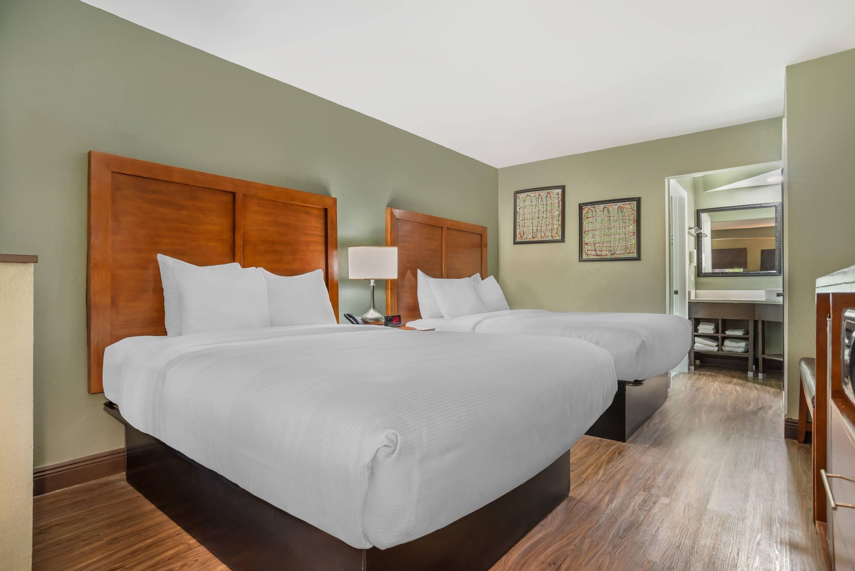 Suite, Multiple Beds, Non Smoking | Desk, iron/ironing board, free WiFi, bed sheets