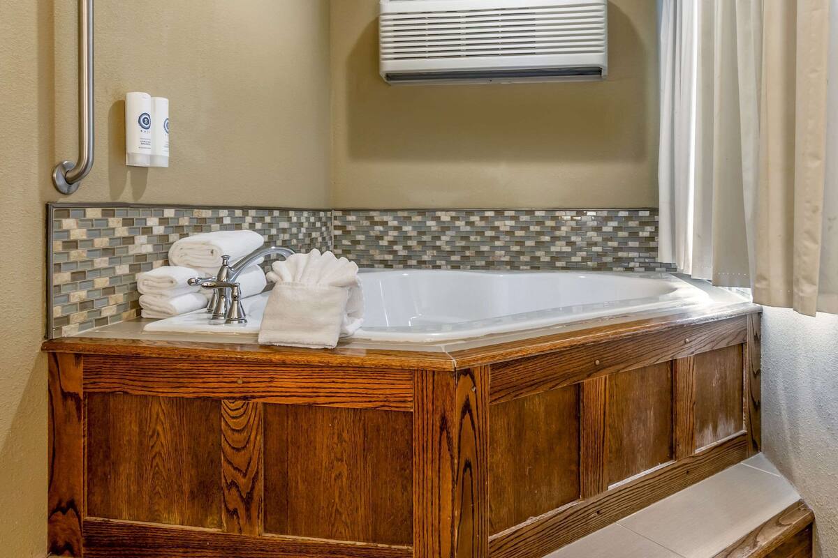 premium bedding, blackout curtains, iron/ironing board