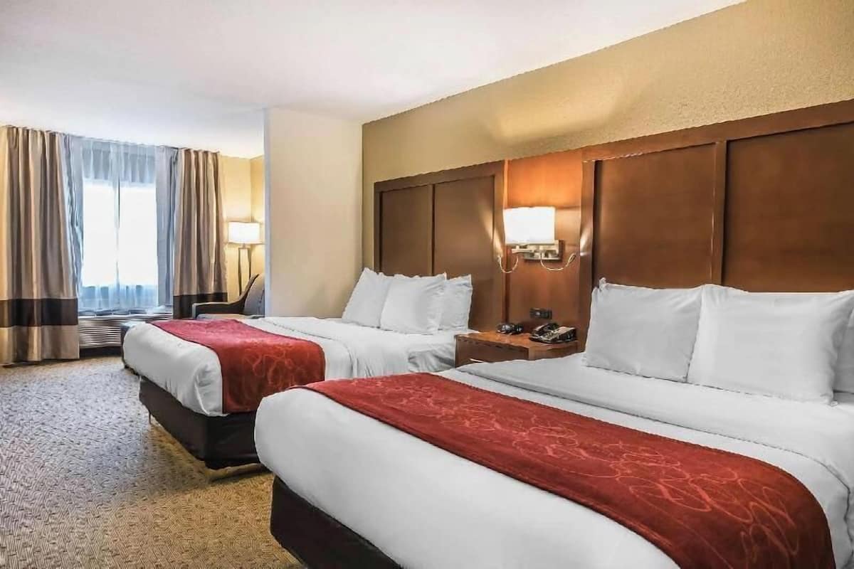 Premium bedding, desk, blackout drapes, iron/ironing board