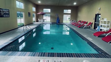 Indoor pool, open 10:00 AM to 10:00 PM, pool loungers