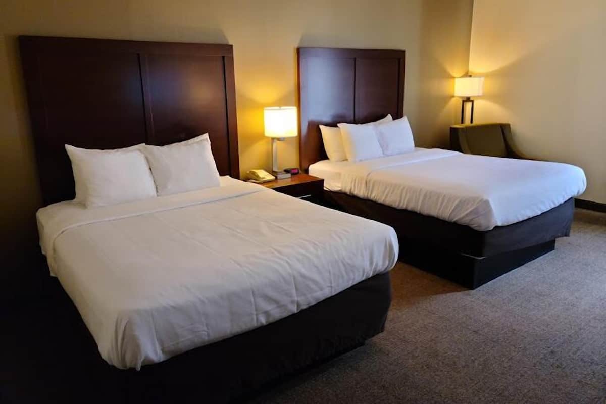 Standard Room, 2 Queen Beds, Non Smoking | 1 bedroom, desk, laptop workspace, blackout curtains