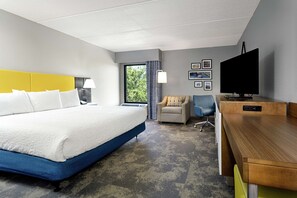 Premium bedding, pillow-top beds, desk, laptop workspace