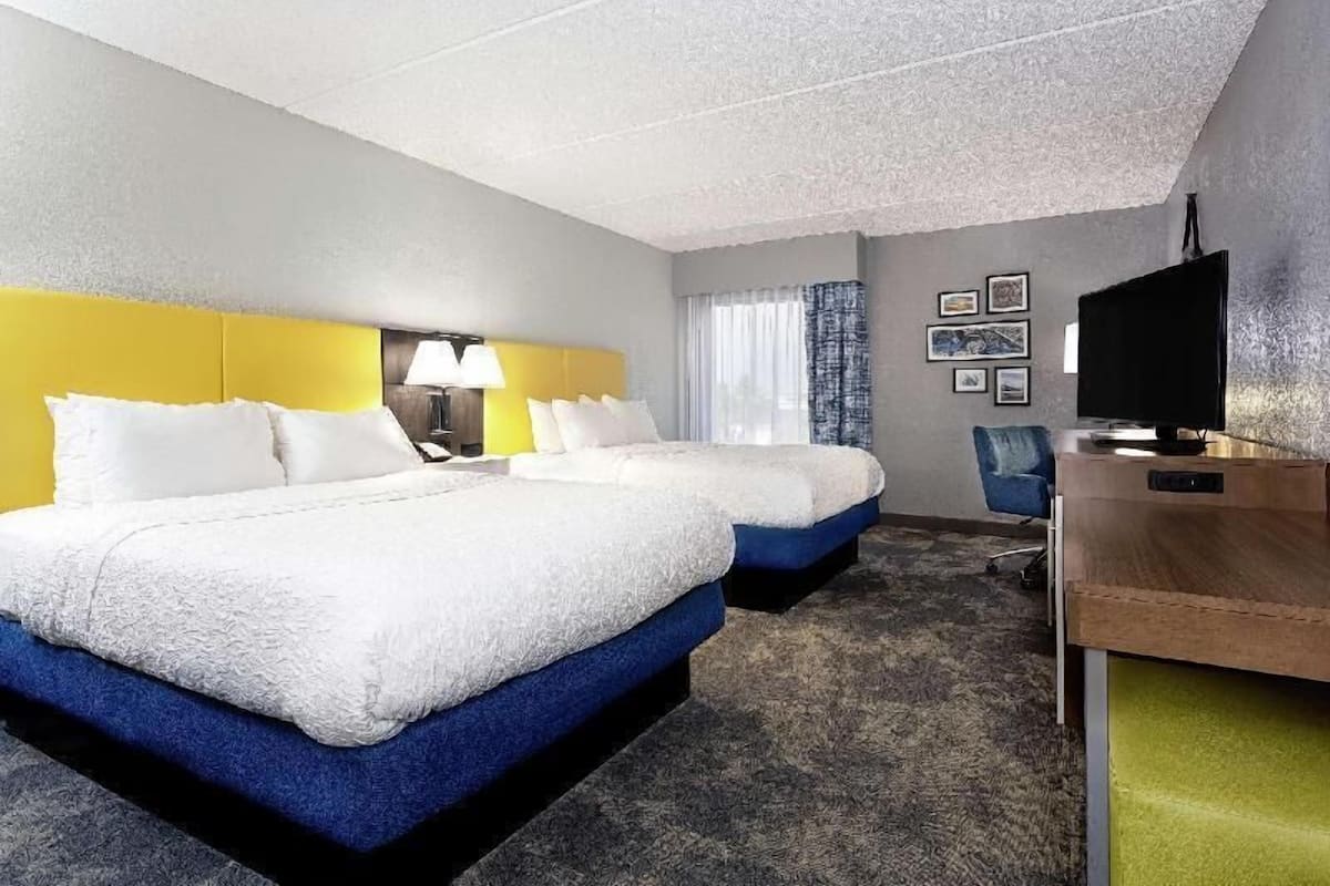 Premium bedding, down comforters, pillowtop beds, desk