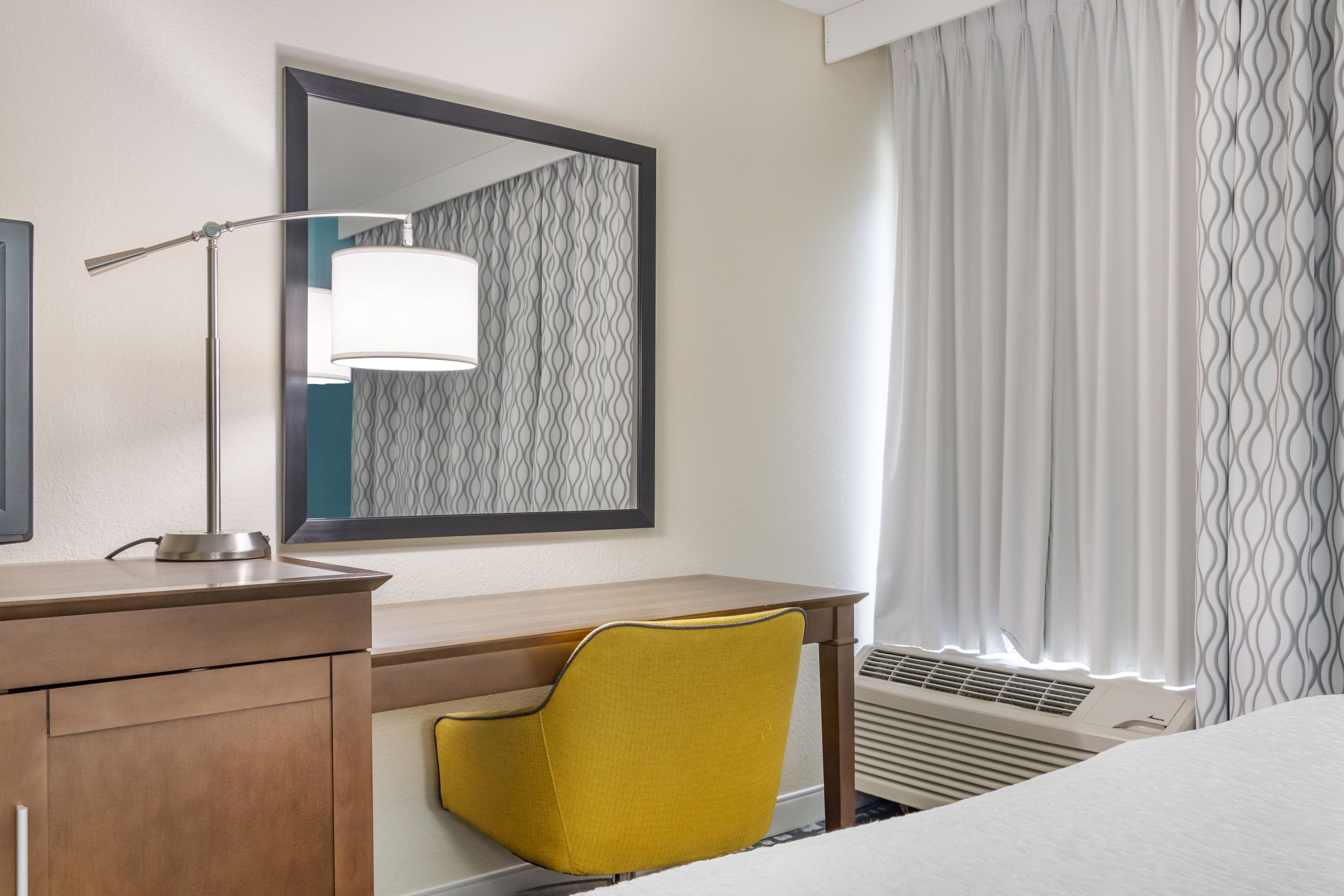 desk, laptop workspace, blackout curtains, iron/ironing board